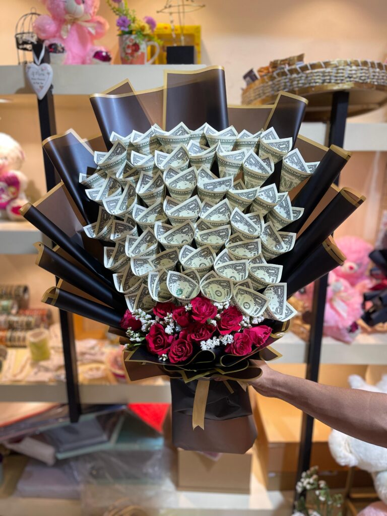 US dollar cash bouquet with forty $1 notes and red roses with baby's breath