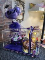 Luxury acrylic gift box with custom balloon, LED letter, cake, and flower chocolate bouquet for special occasions in Pakistan