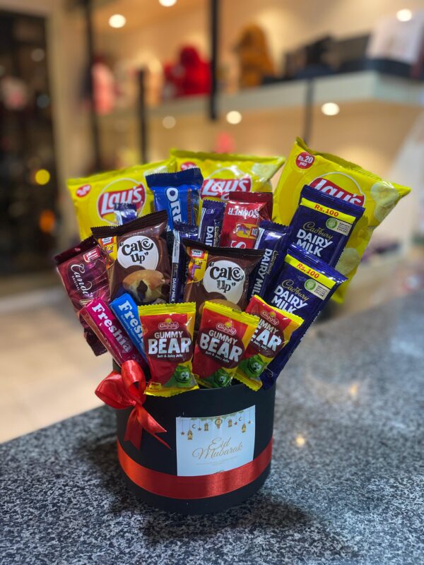 Assorted gummy bears and dairy snacks combo pack with vibrant packaging, perfect for quick snacks and gifts